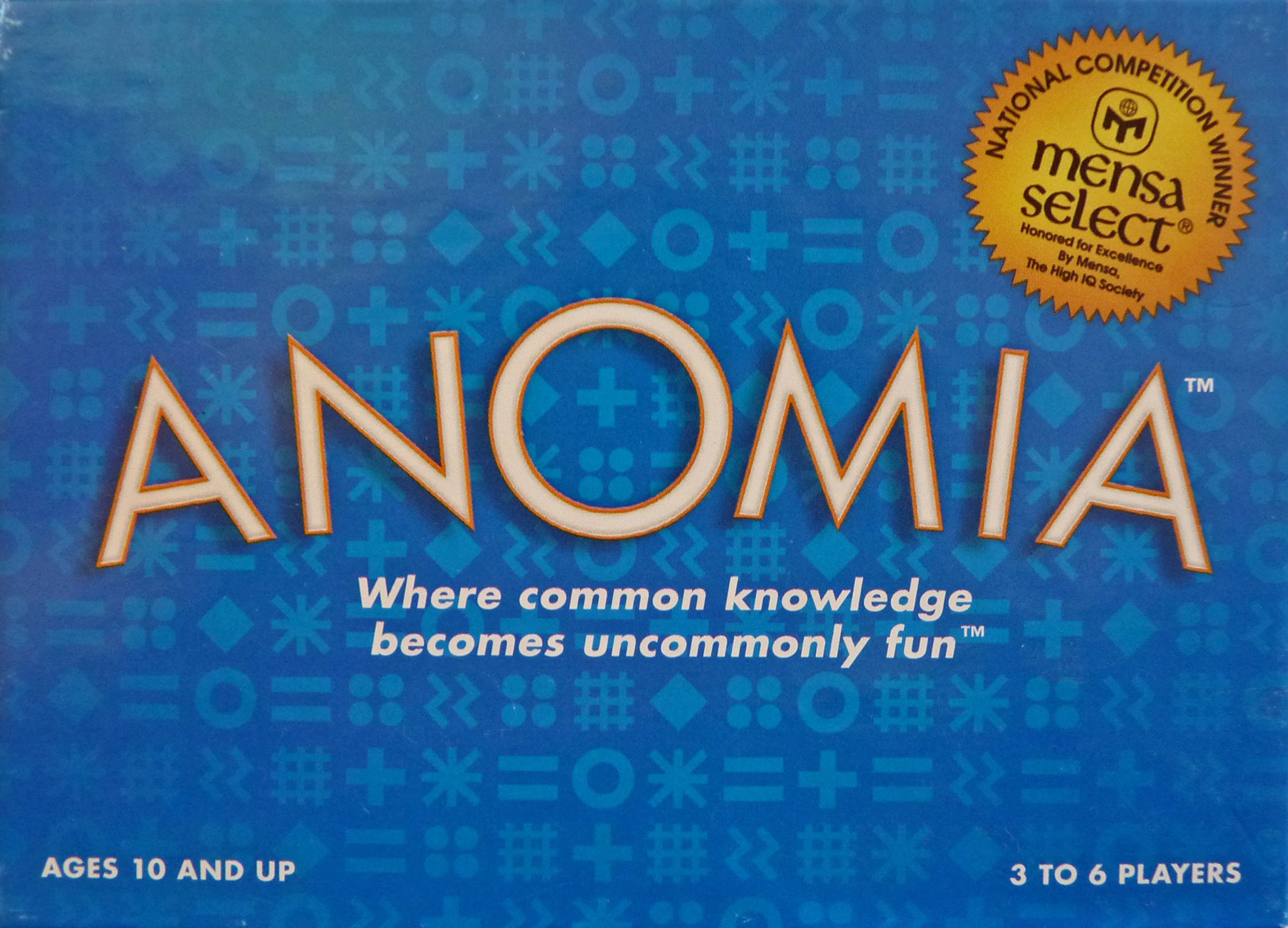 Board game box for 'Anomia' with a blue background and gold text.