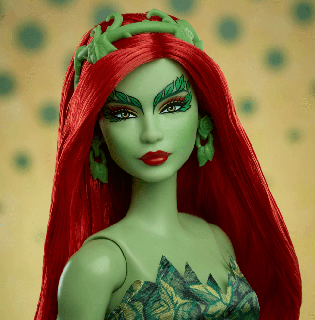 Green-skinned figure with red hair and leaf-themed outfit against a polka dot background