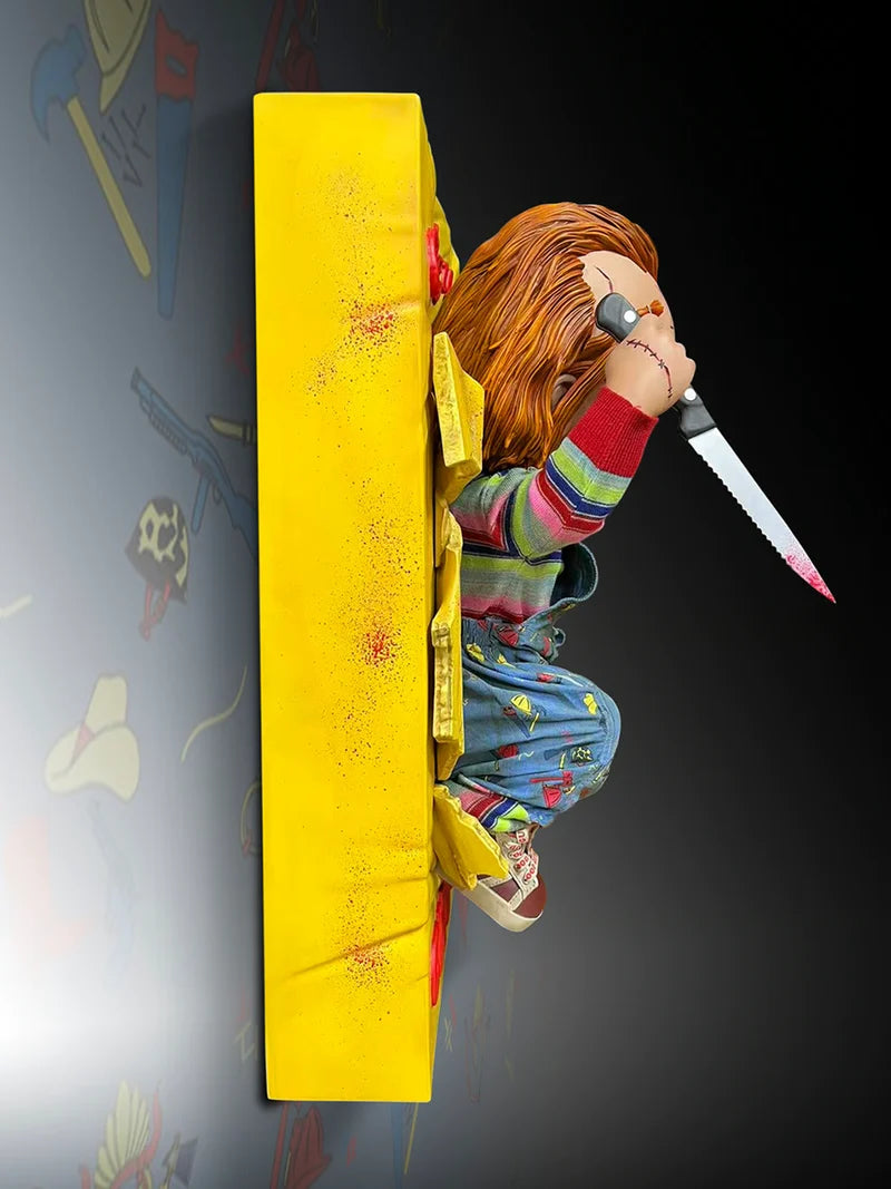 Statue of a character with a knife emerging from a yellow box on a dark background