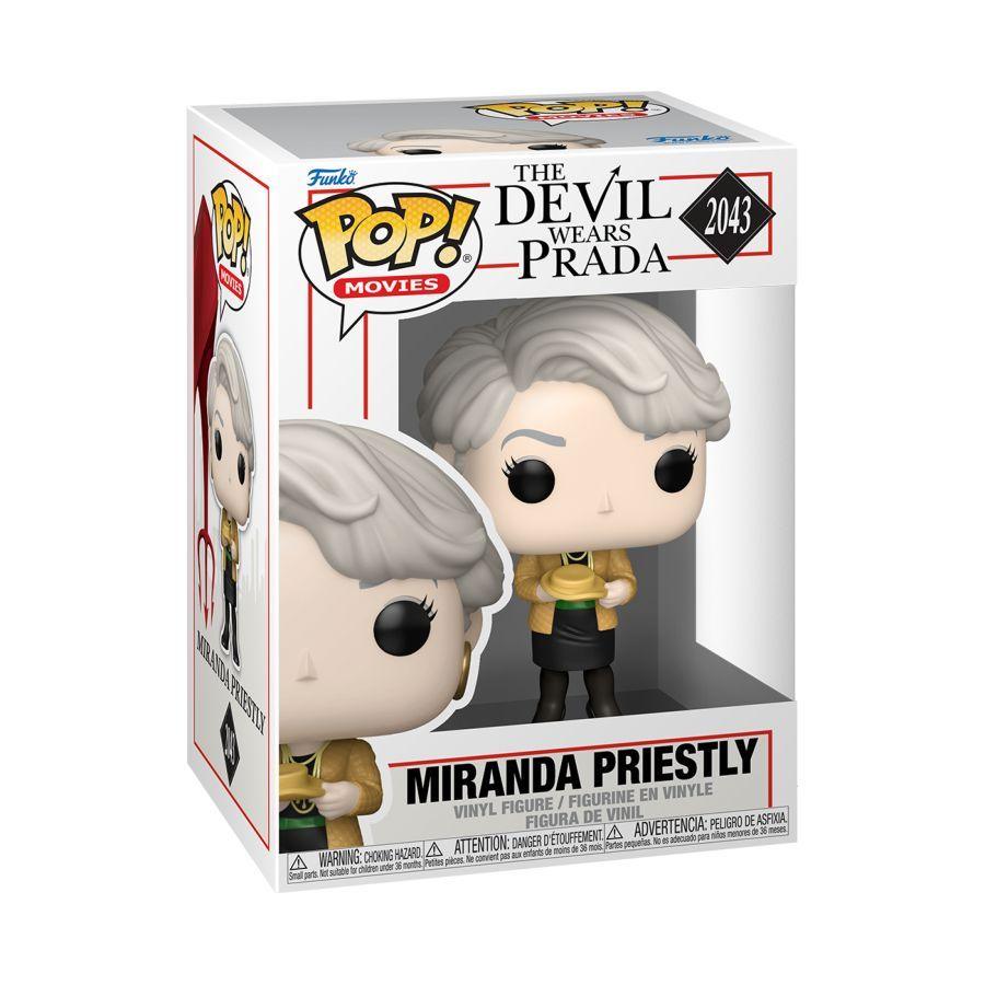 Funko branded packaging with clear window. Figure has gold hat and jacket, gold necklace, black boots and pencil skirt. 