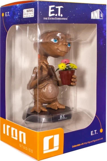 E.T. figurine holding flowers in a box with Iron Studios branding