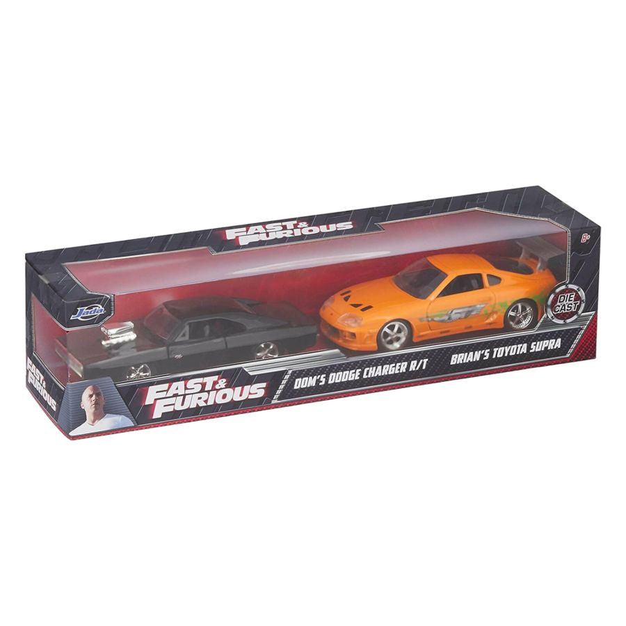 Boxed set of 'Fast & Furious' model cars featuring a red car and an orange car.