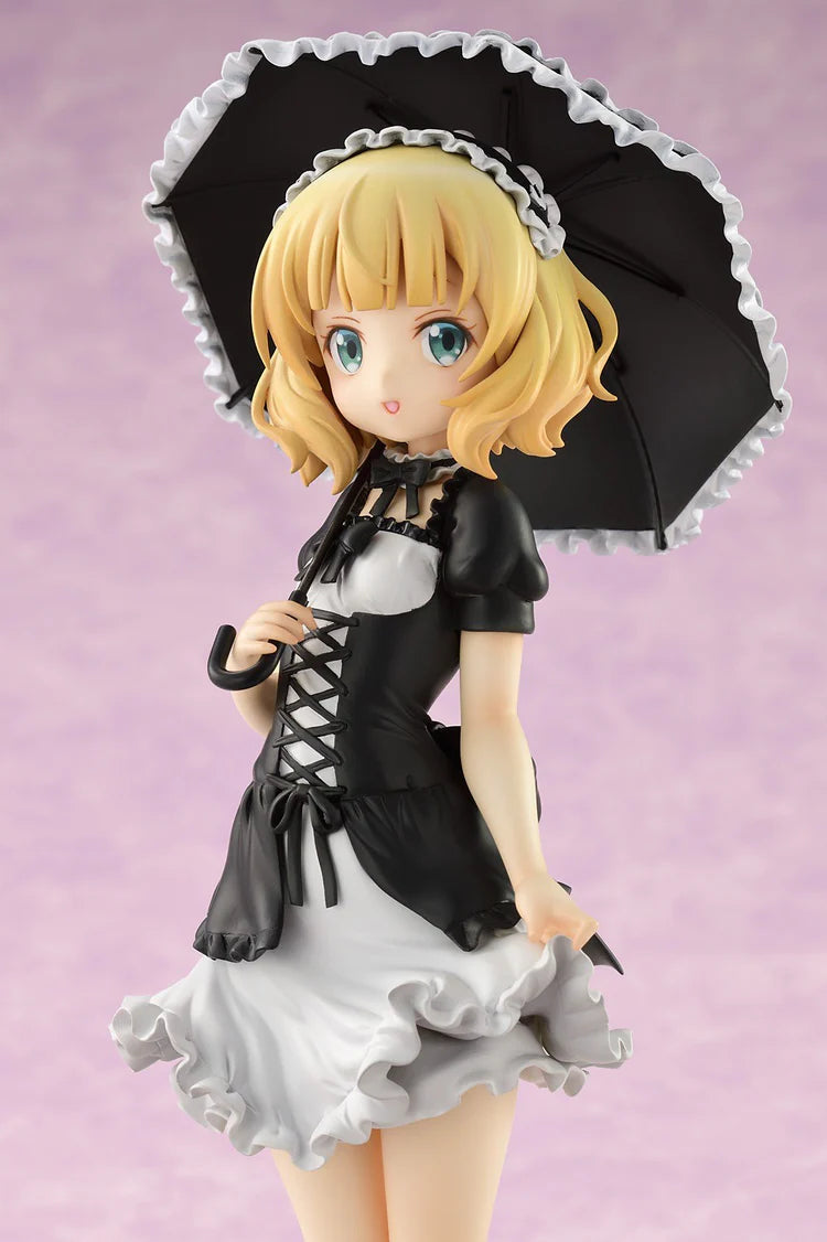 Action figure in Lolita dress with umbrella and pet rabbit. 