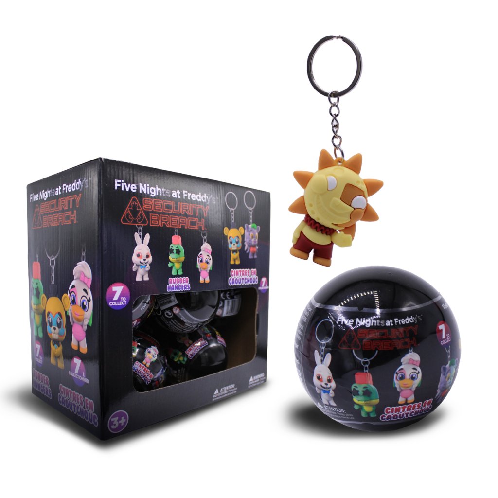 Five Nights at Freddy's Security Breach Mystery Box blind bag set, showing the black retail box, a black blind ball with character graphics, and a yellow sun-shaped keychain charm.