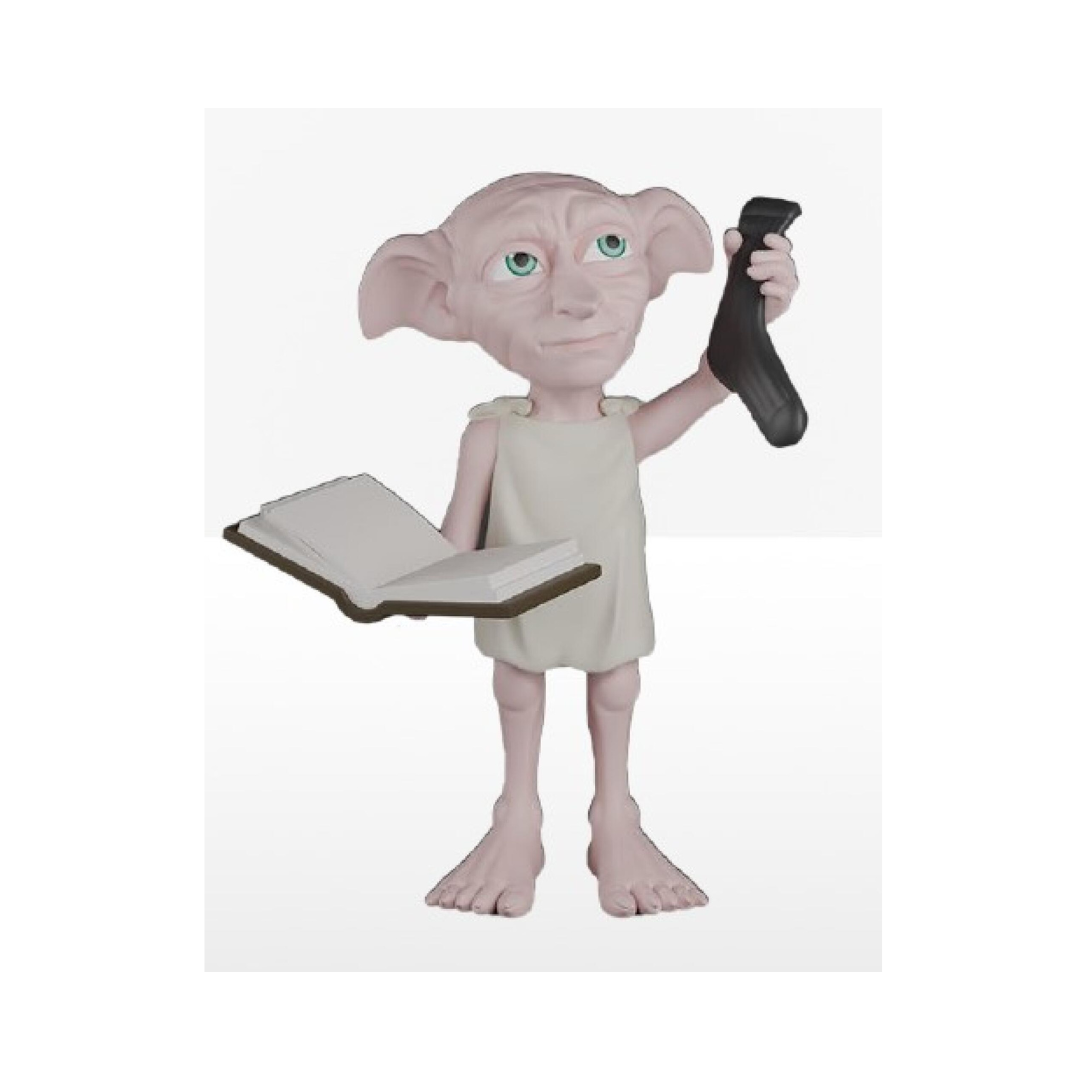 Toy figure of a character holding a book and a sock on a white background