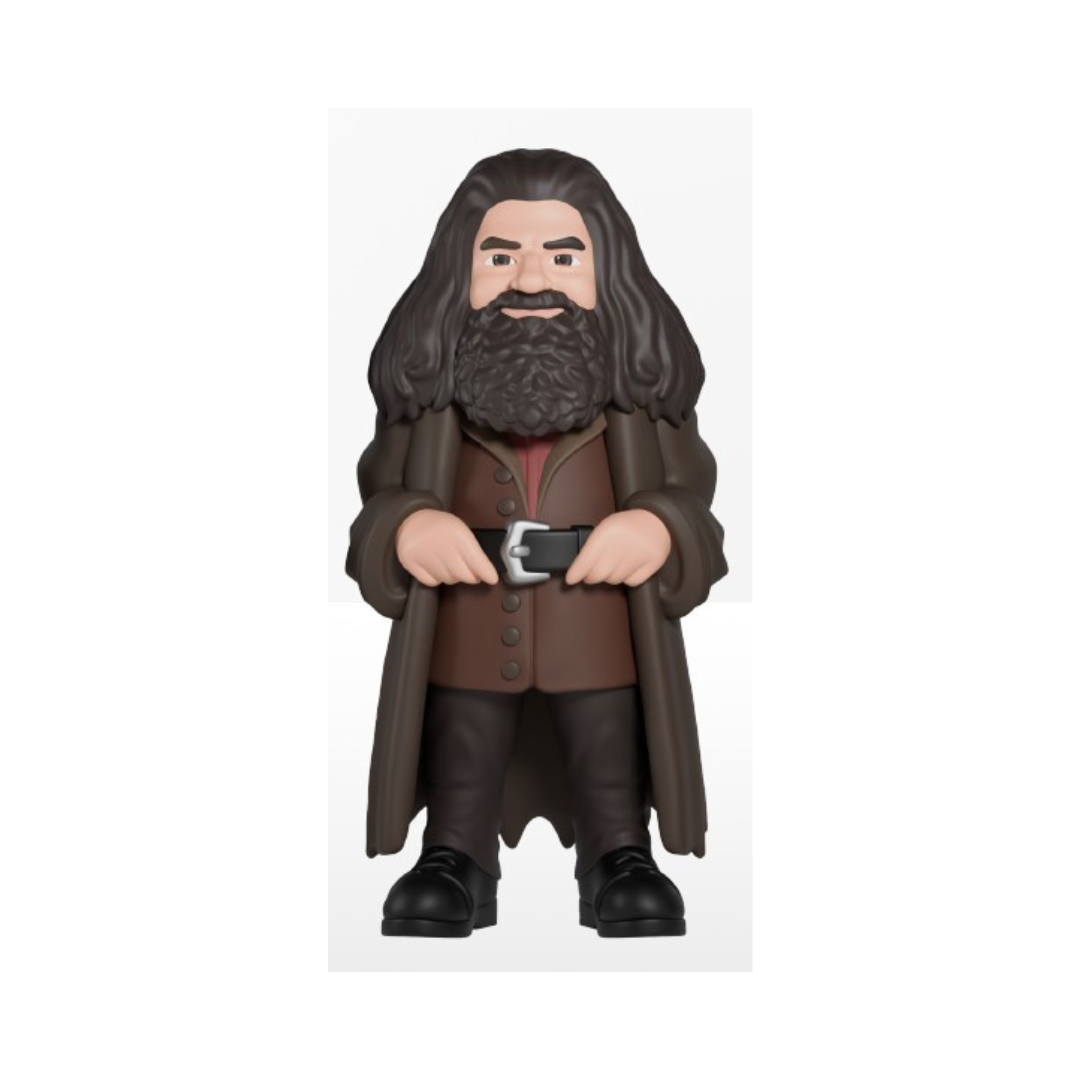 Action figure of a character with long hair and beard, wearing a brown coat and boots on a white background
