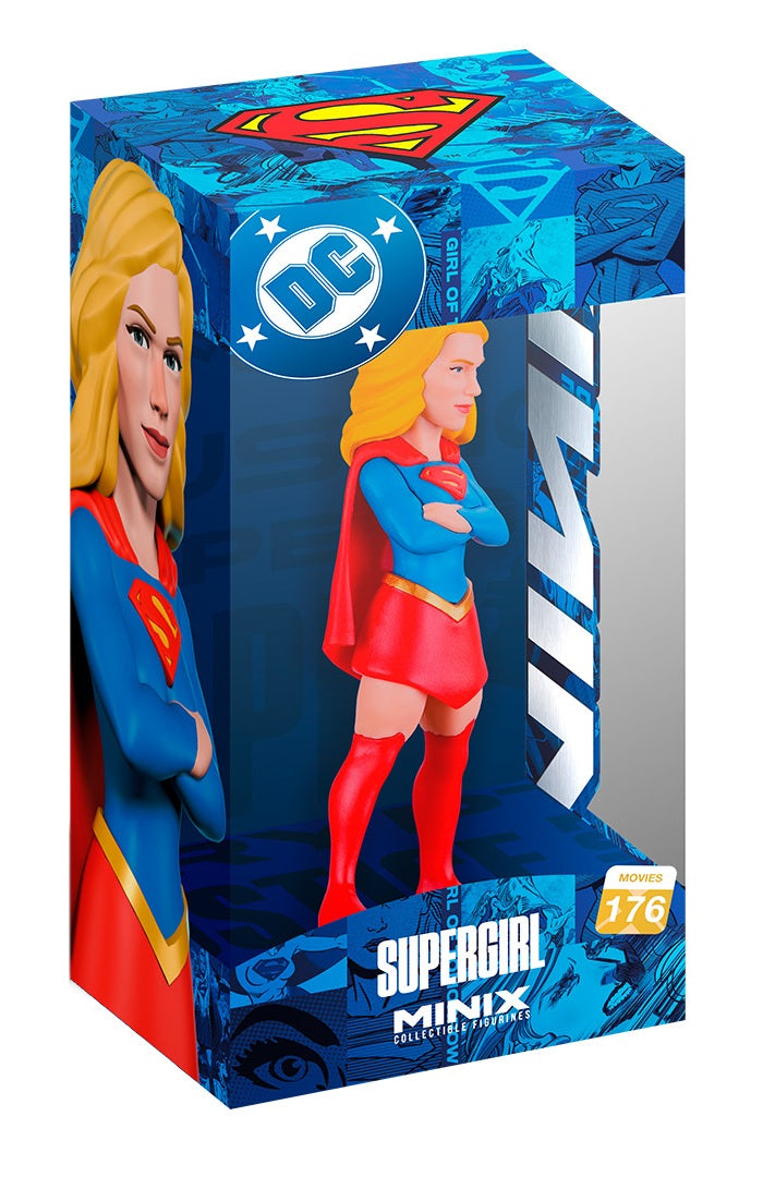 DC Comics Supergirl Minix collectible figure in its original blue retail packaging, featuring character artwork of Supergirl in a blue and red costume with blonde hair.