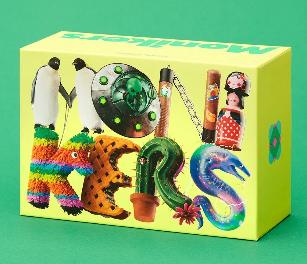 Colorful packaging with penguins, a ufo, nunchucks, a Russian doll and more. Monikers Family Edition Card Game.