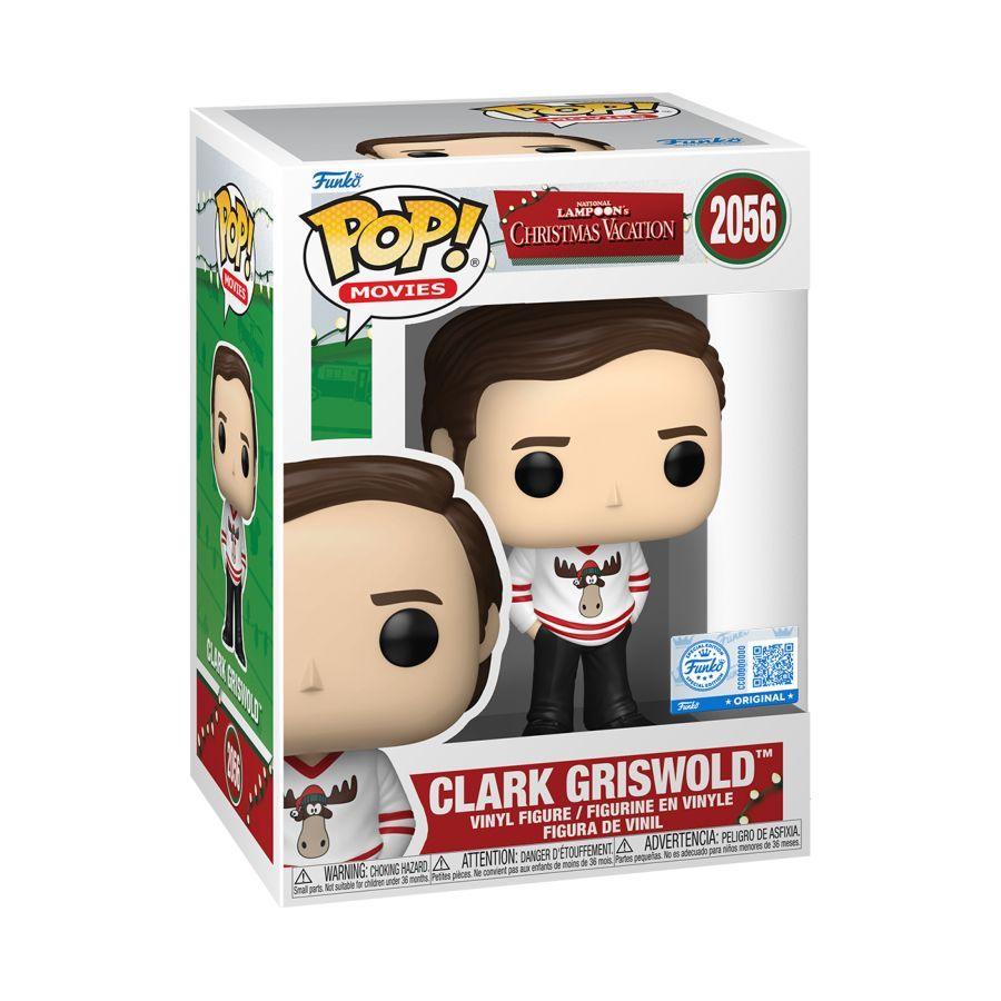 Funko branded packaging with clear window. Inside is a figure of clark, wearing a white sweater with a moose. 