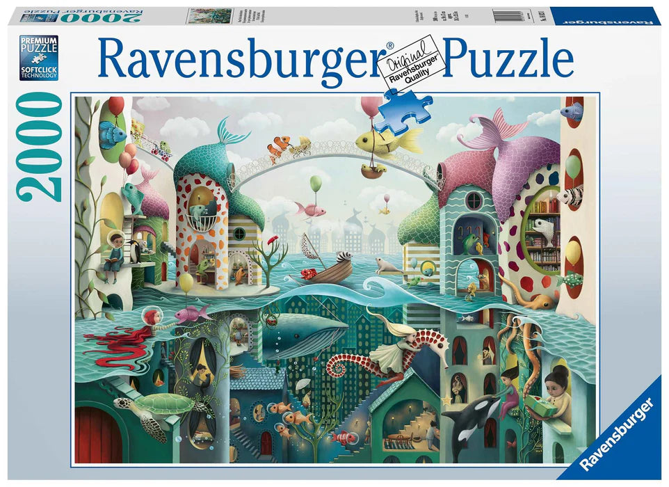 Ravensburger branded packaging with completed puzzle image. Image shows fish above water living life and humans under the sea. 