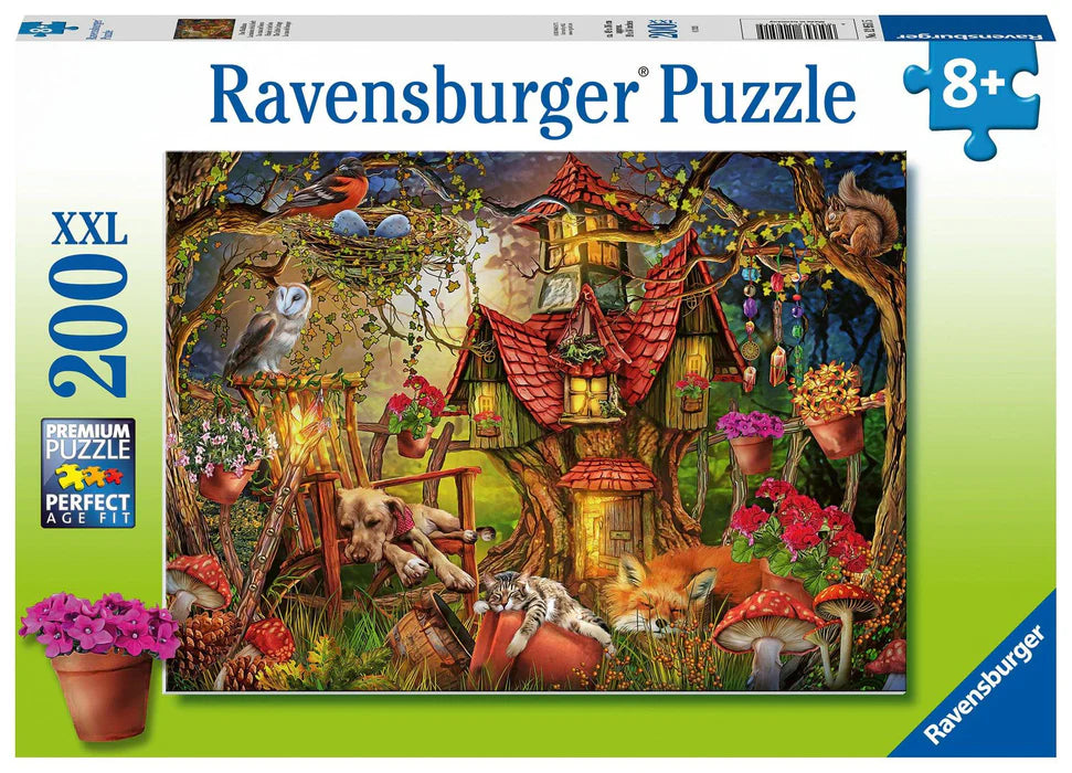 Ravensburger branded box with assembled puzzle image shown. Finished puzzle features, fairy themed treehouse, Red mushrooms, trees and wildlife. 