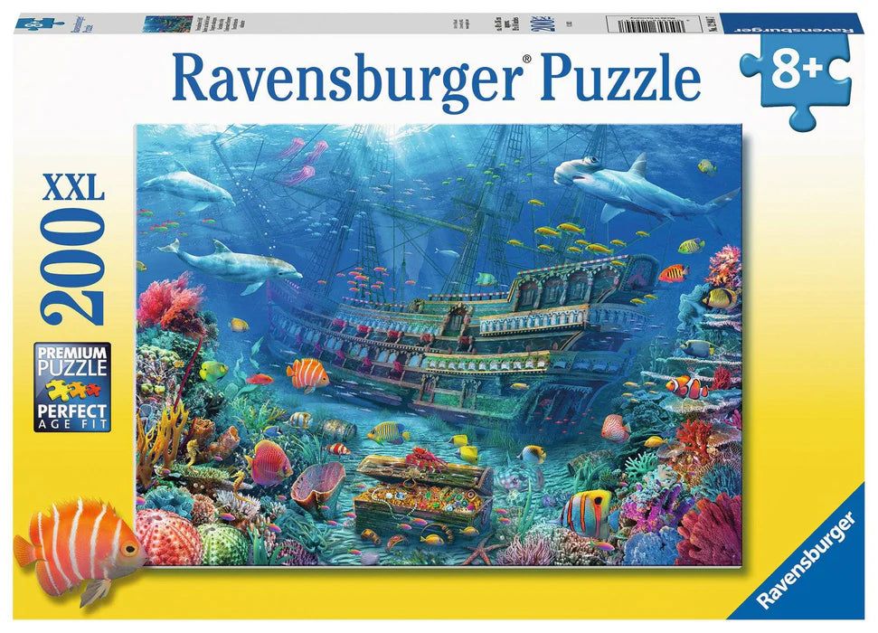 Ravensburger branded packaging with completed puzzle image on cover. Image shows underwater shipwreck with treasure chest, tropical fish, coral and more. 