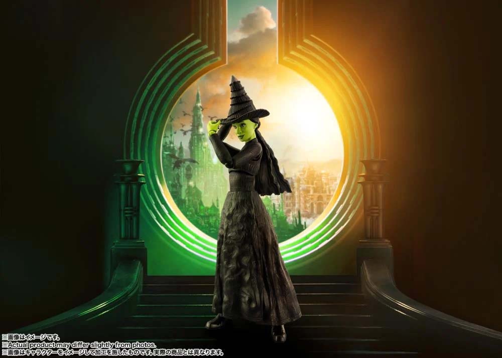 Elphaba Action Figure, posed in front of Emerald City.