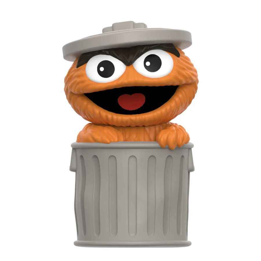 Orange Sesame Street character with a gray hat peeking out from a trash can on a white background