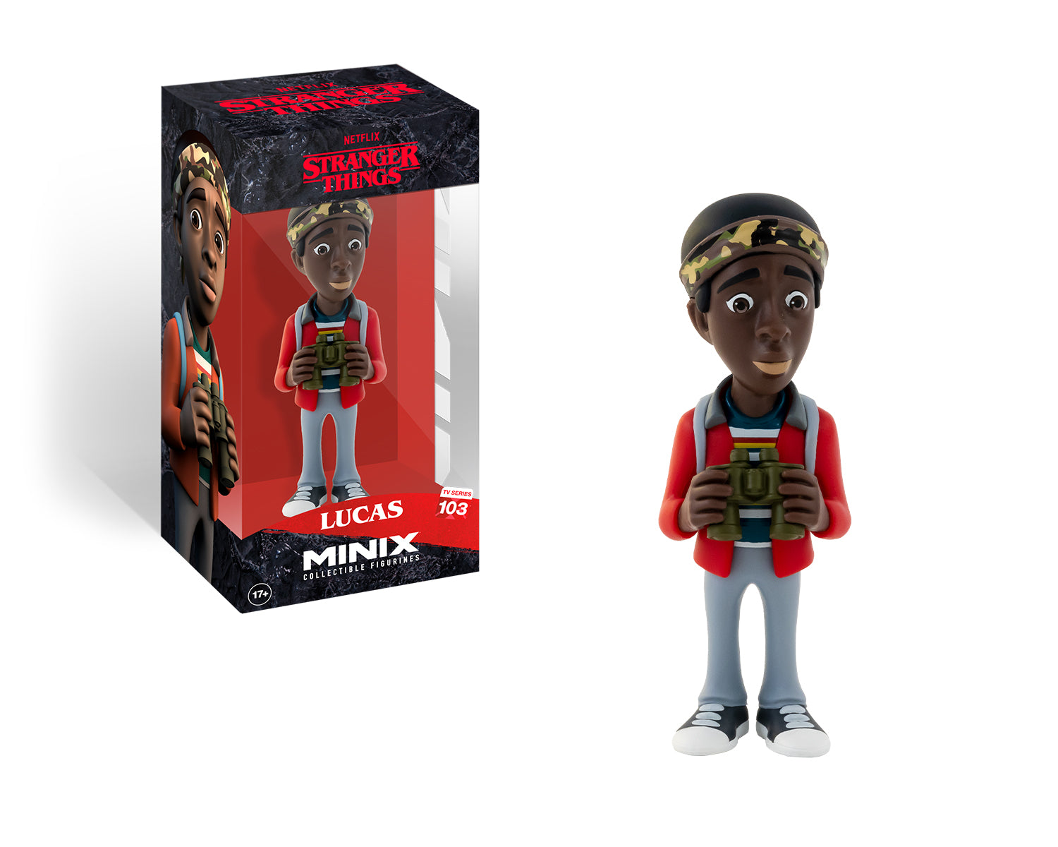 A Stranger Things Lucas Minix 103 toy figure, presented in front of its packaging box. The figure wears a red jacket and blue jeans and holds a camera.