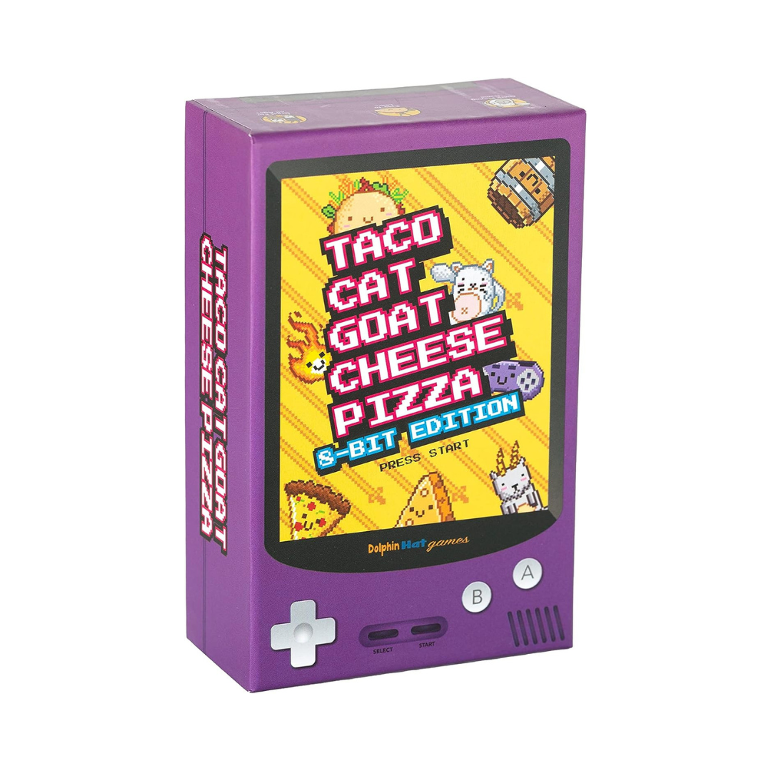 Purple game console-shaped box with 'Taco Cat Goat Cheese Pizza' text and graphics on a white background