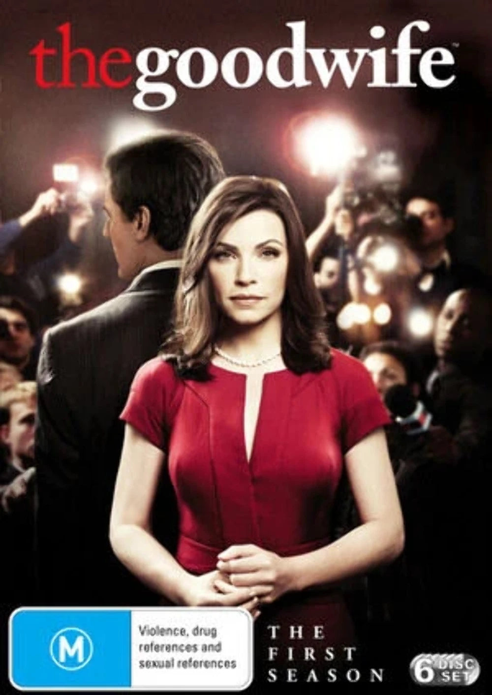 Promotional poster for 'The Good Wife' with a woman in a red dress and a man in a suit, surrounded by photographers.