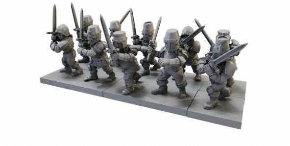 Set of miniature figures in armor with weapons on a gray base