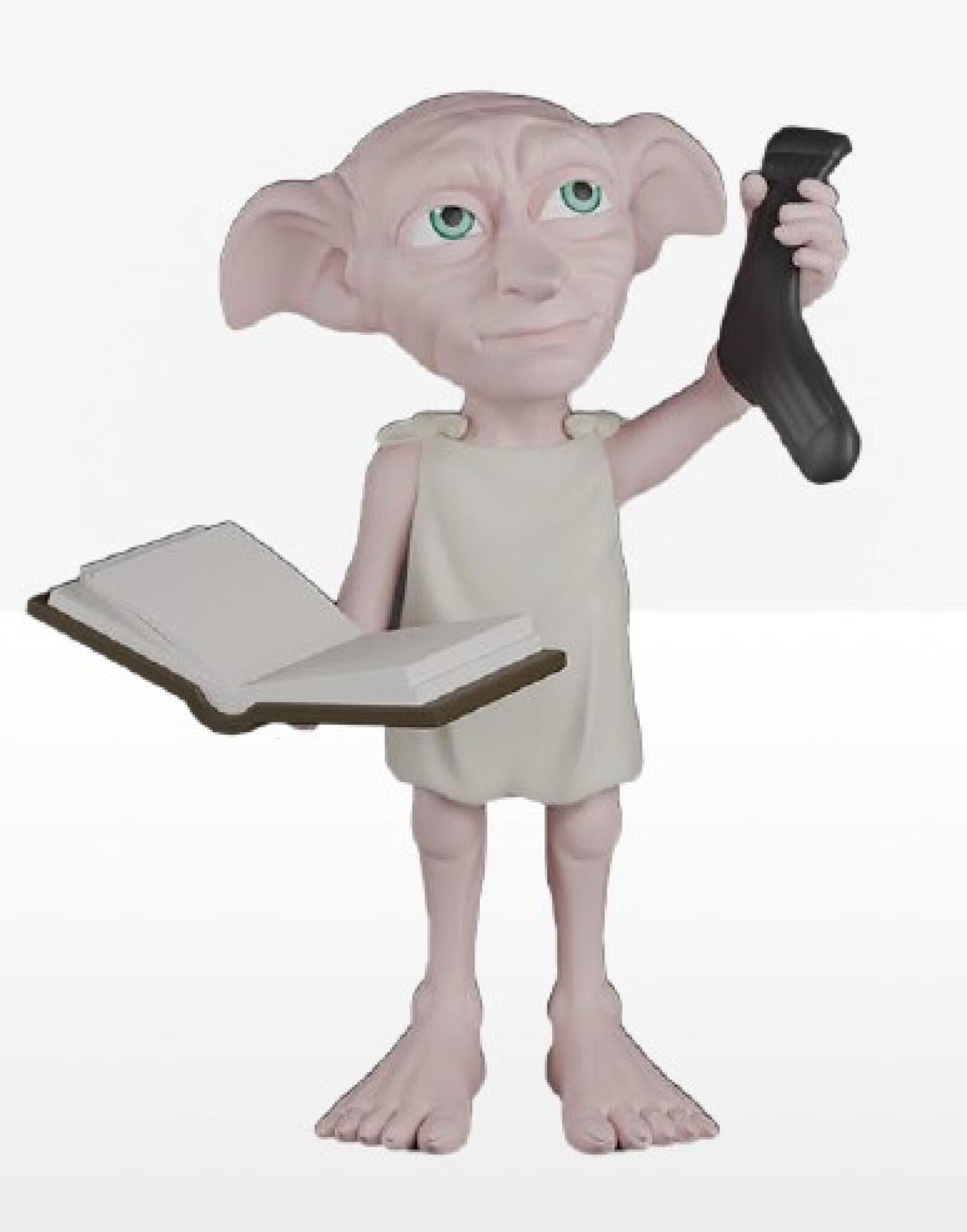 Toy figure of a character holding a book and a sock on a white background
