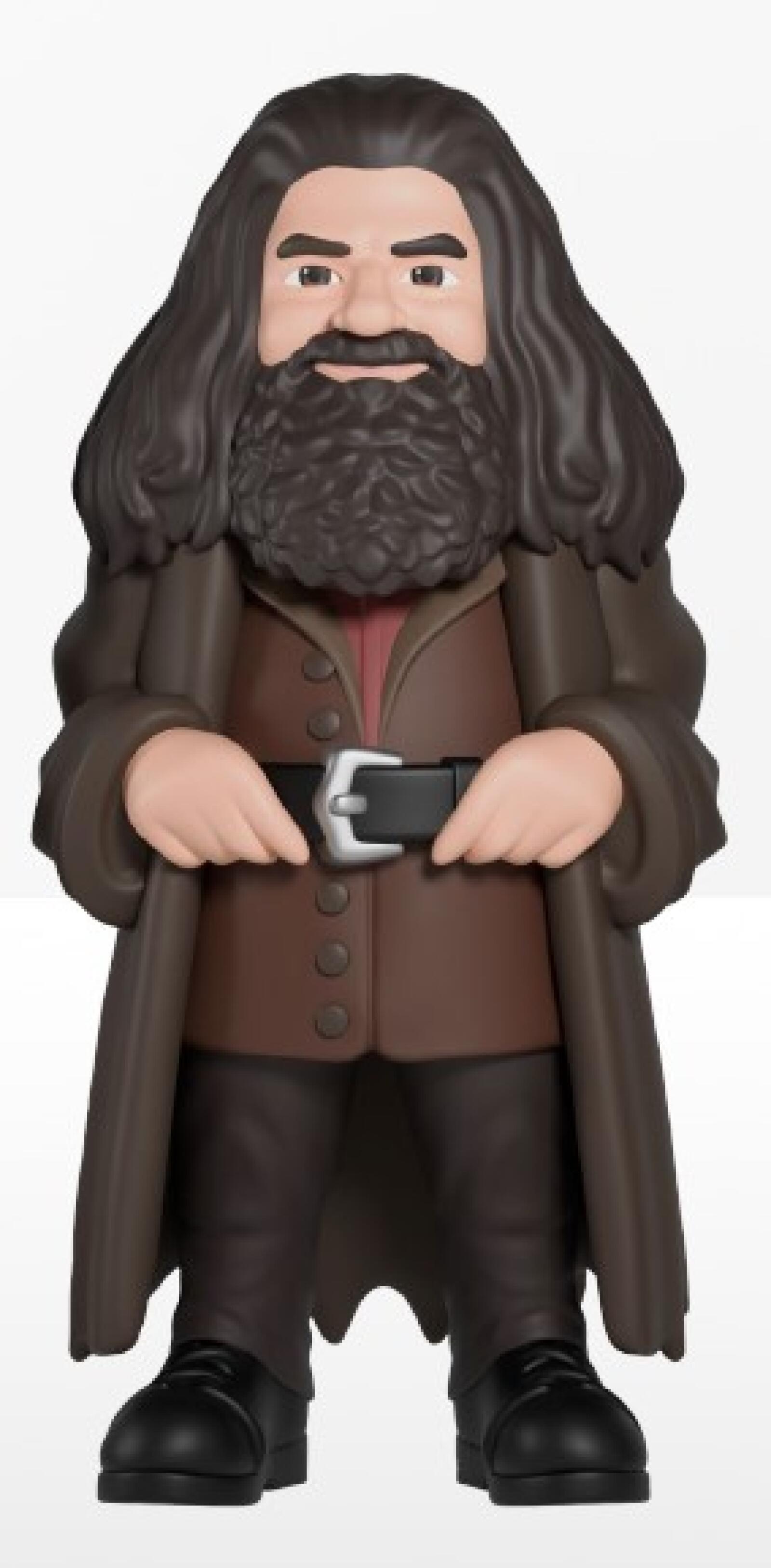 Action figure of a character with long hair and beard, wearing a brown coat and holding a belt.