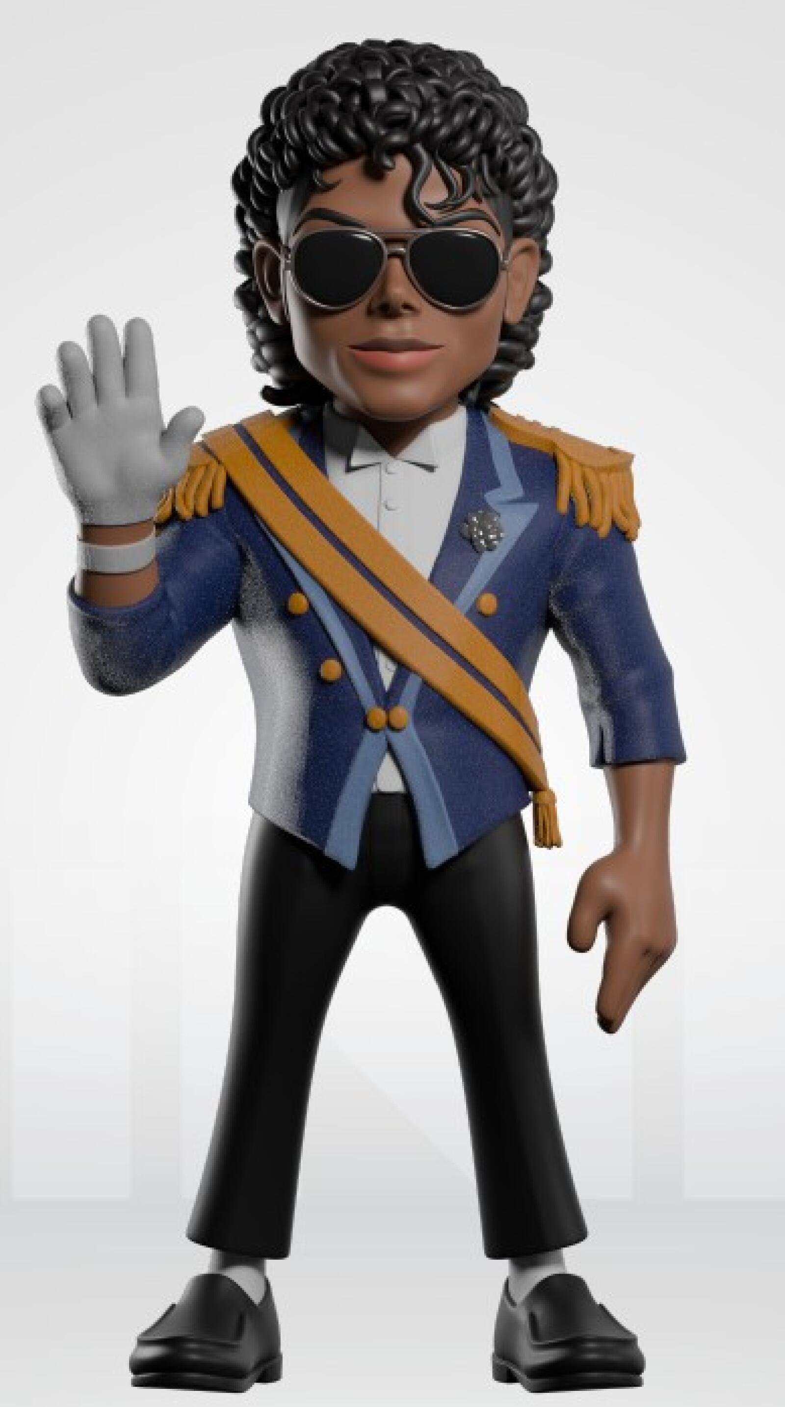 A stylized collectible figurine of Michael Jackson in a military-inspired uniform, featuring a blue jacket with gold epaulets and sash, black trousers, white gloves, and black sunglasses, set against a plain light gray background.