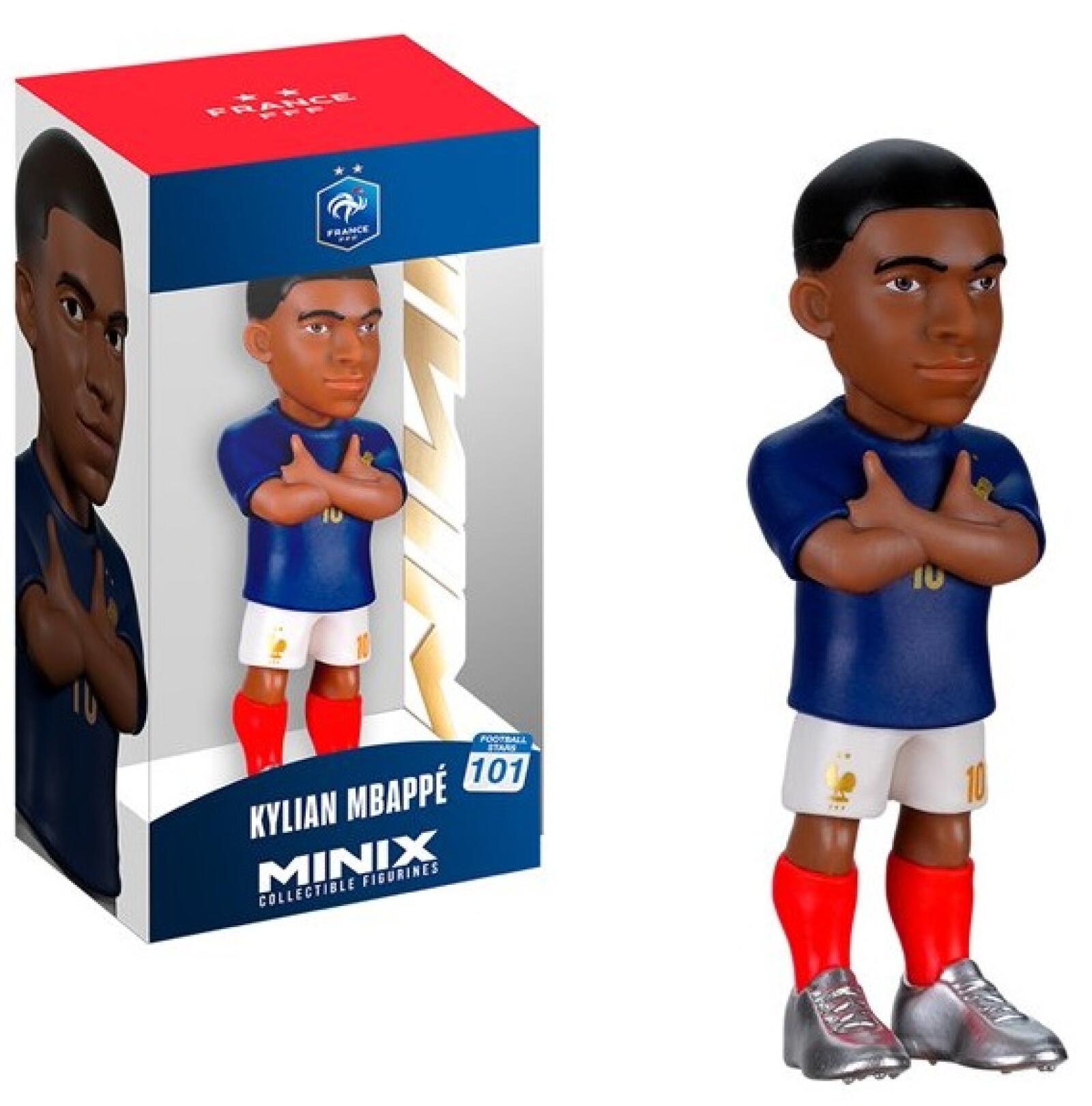 Collectible figurine of a soccer player with packaging displaying branding.