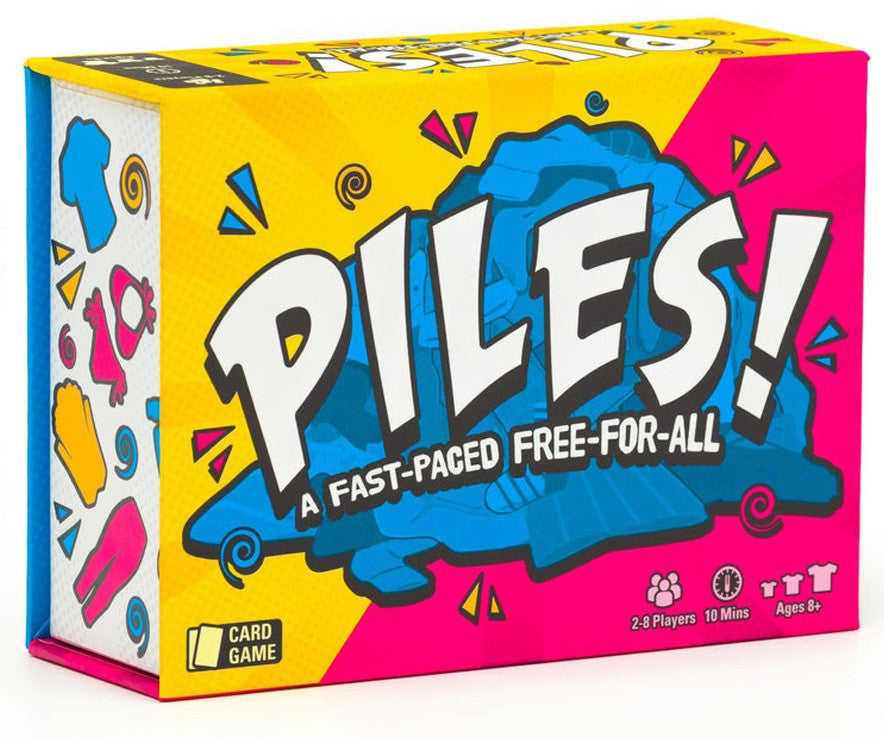 The image shows the box of the card game 'Piles!' which has vibrant, colorful graphics and text, indicating it is a fast-paced, free-for-all card game suitable for 2-8 players, ages 8+.