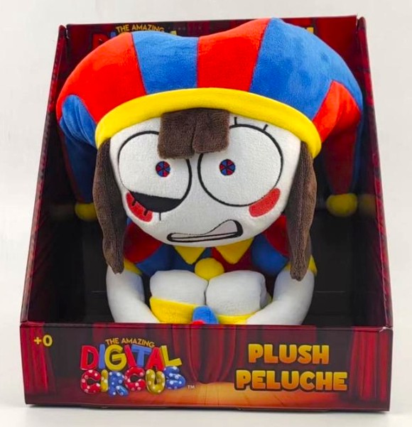 Plush toy with colorful hat in packaging, featuring 'The Amazing Digital Circus' branding.